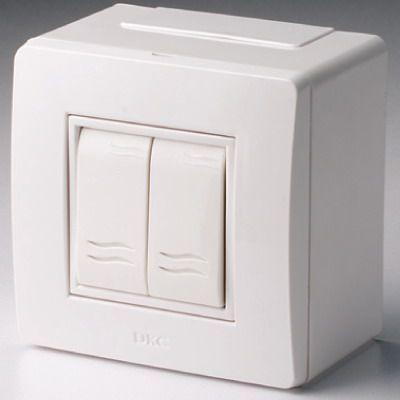 Коробка с выключателем 2-кл. 2мод. ОП 10А IP20 корич. DKC 10001B